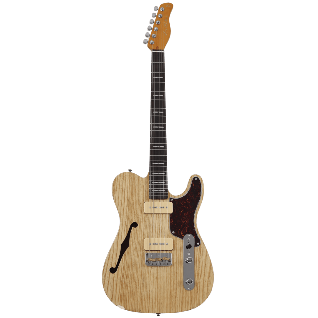 Sire T7 TM Natural - Guitarra Eléctrica | T7TM tiene una apariencia y un sonido más modernos. Compartiendo el mismo concepto, presenta dos pastillas P90 y un puente de trémolo, ofreciendo una mayor potencia de salida y una sensación moderna. Su versatilid