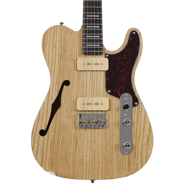 Sire T7 TM Natural - Guitarra Eléctrica | T7TM tiene una apariencia y un sonido más modernos. Compartiendo el mismo concepto, presenta dos pastillas P90 y un puente de trémolo, ofreciendo una mayor potencia de salida y una sensación moderna. Su versatilid
