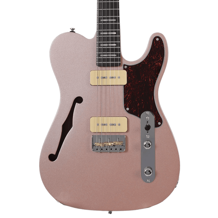 Sire T7 TM Rosegold - Guitarra Eléctrica | T7TM tiene una apariencia y un sonido más modernos. Compartiendo el mismo concepto, presenta dos pastillas P90 y un puente de trémolo, ofreciendo una mayor potencia de salida y una sensación moderna. Su versatili