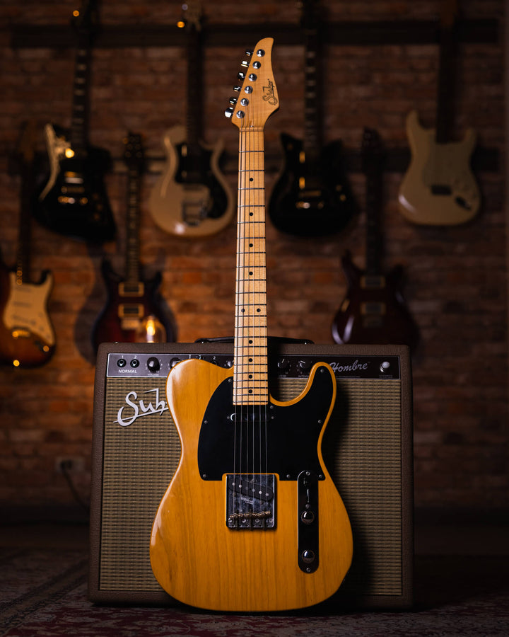 Suhr Classic T Antique Trans Butterscotch 2018 - Guitarra Eléctrica | El Classic T cuenta con un nuevo perfil de cuello estándar C vintage de los años 60. El Classic T conserva muchas de las especificaciones originales del Classic T Pro, incluido el siste