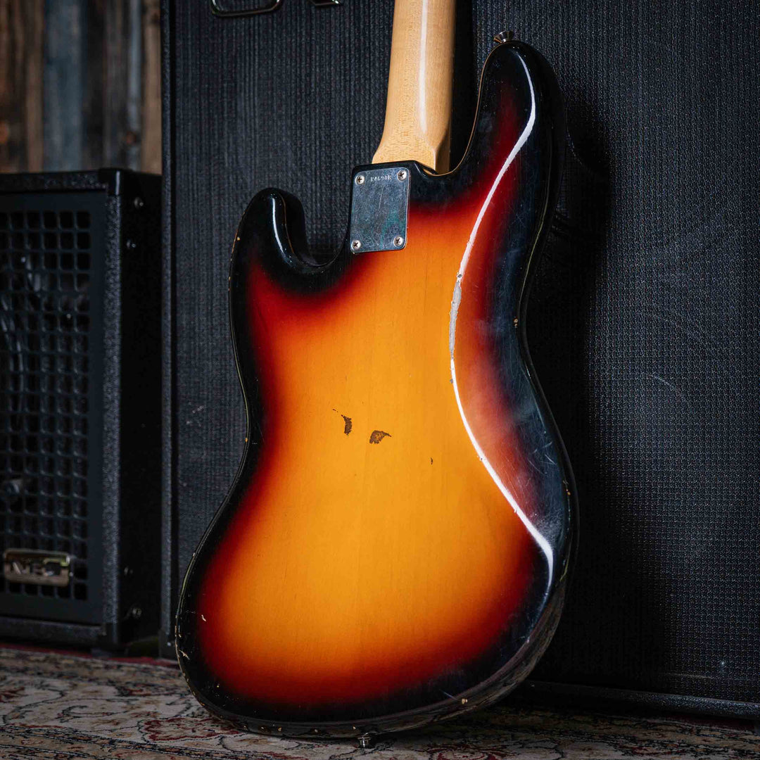 Fender Jazz Bass Custom Shop 64 Sunburst 2019 - Bajo Eléctrico | El Fender Jazz Bass Custom Shop '64 es una versión de lujo del legendario bajo eléctrico Jazz Bass de Fender, diseñado para replicar fielmente el aspecto, sonido y sensación vintage del mode