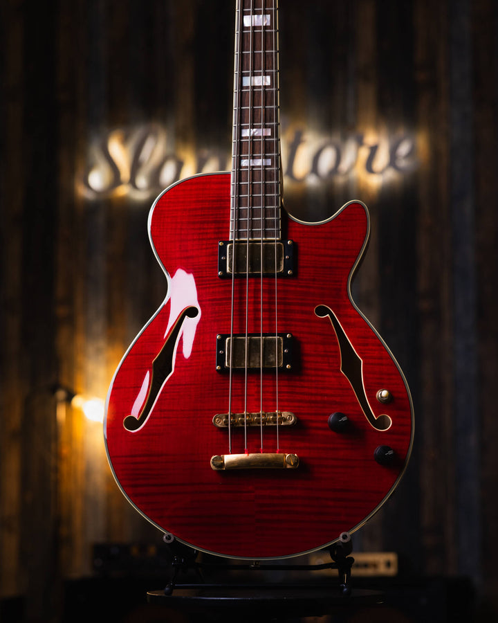 D'Angelico EX-Bass Trans Cherry Red 2015 - Bajo Eléctrico | D'Angelico Guitars presenta el EX-Bass con un cuerpo semihueco de un solo corte y 32.25" escala que lleva el ambiente clásico y la sensación vintage que se espera de este clásico artesano de inst