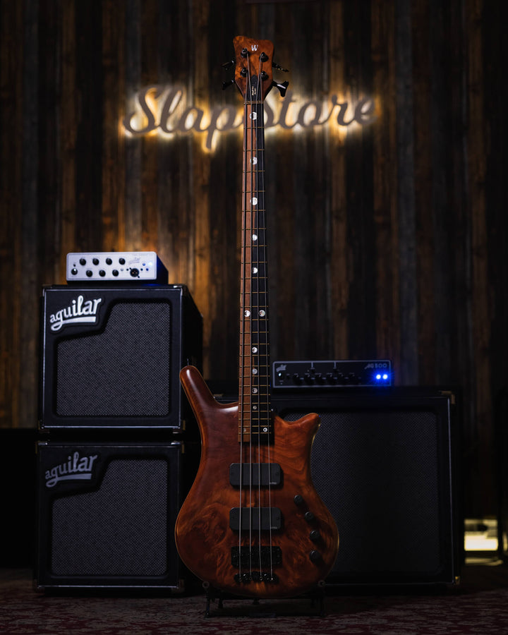 Warwick Thumb BO Vavona Burl Limited Edition 2013 - Bajo Eléctrico | Cuerpo • Modelo: Thumb• Madera: Swamp Ash• Top: Vavona Burl• Terminación: Satin Brazo • Madera: Wenge • Perfil: “C”• Terminación: Satin • Espaciado: 18 mm• Escala: 34” • Nuez: Just-A-Nut