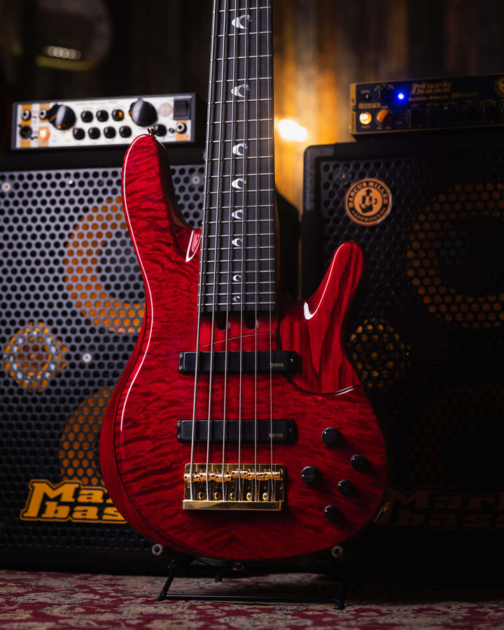 Yamaha TRB-JP2 Translucent Dark Red 20XX - Bajo Eléctrico | Cuerpo • Modelo: TRB-JP2• Madera: Figured Maple/Ash/Alder/Maple• Top: Figured Maple• Terminación: Gloss Polyurethane Brazo • Madera: Maple 3-Piece• Perfil: Custom "D"• Terminación: Gloss Polyuret