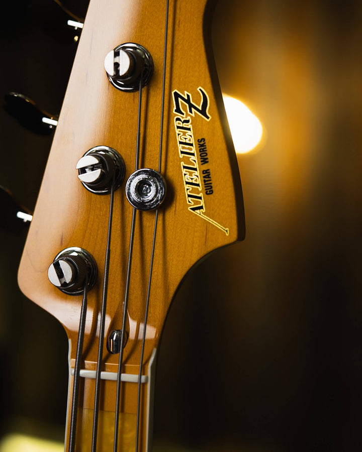 Atelier Z M245'70 Plus Vintage Natural 2024 -Bajo Eléctrico | Cuerpo • Model: M245'70• Madera: Ash • Terminación: Vintage Natural Gloss Brazo • Madera: Tinted Maple• Perfil: “C”• Terminación: Matte • String Spacing: 19 mm• Escala: 34” • Nuez: Bone Diapasó