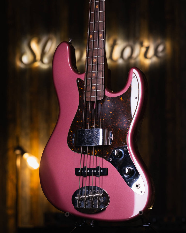 Lakland USA 44-60 (Joe Osborne) Burdgundy Mist 2004 - Bajo Eléctrico | Trabajamos en el diseño de este instrumento para combinar los atributos más deseables de un J-bass vintage (el mástil delgado de la era de 1960, perillas de control concéntricas y las