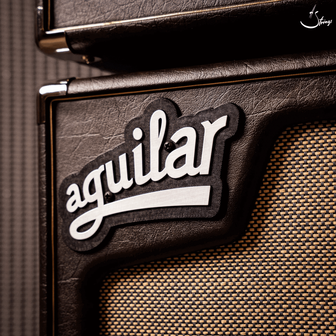 Aguilar SL 110 Chocolate Brown - Gabinete de Bajo | El gabinete Aguilar SL 110 es un altavoz de alta calidad con un solo altavoz de 10 pulgadas, una potencia de 175 Watts y una impedancia de 8 ohmios. Su atractivo diseño en tono "Chocolate Brown" le confi
