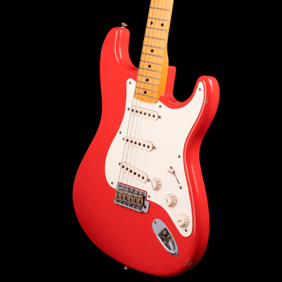 Fender Custom Shop Stratocaster Fiesta Red '56 Soft Relic 2011 - $4599990 - Gearhub - The Fender Stratocaster is probably the most iconic guitar ever produced and the Fender Custom Shop '56 Stratocaster is a fitting addition to this legendary line.The Alder body is finished in a classic Fiesta Red nitro lacquer, period correct, this finish will wear beautifully with time and develop its own character even further. It also allows the natural resonance of the body to sing and sustain much more effectively com