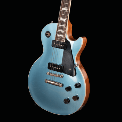 Gibson Les Paul Classic Pelham Blue 2018 - $2599990 - Gearhub - The Les Paul Classic guitar conveys major elements of the iconic Les Paul look with the legendary tonewood combination of a mahogany-and-maple non-weight relief body, bound body top and fingerboard with trapezoid fingerboard inlays. Fast and comfortable playability is increased with a Slim Taper neck. Additional appointments include a pair of P-90 pickups, ABR bridge, nickel-plated hardware, and hand-wired electronics including Orange Drop capa