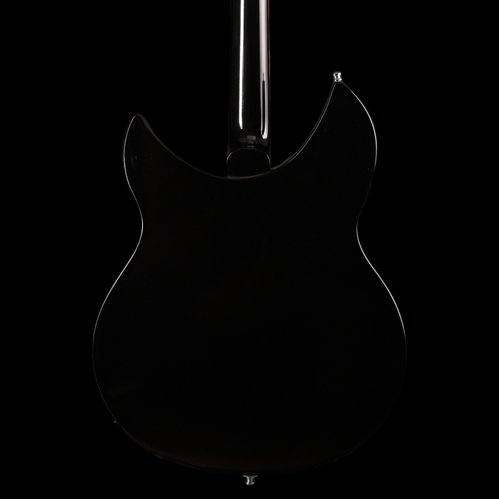 Rickenbacker 330 Jetglo 2006 - Guitarra Eléctrica | Careful acoustic research has resulted in the full, rich and warm sound of this popular model. Two single coil pickups on a full size body are accented by a traditionally shaped sound hole. The 24 fret R