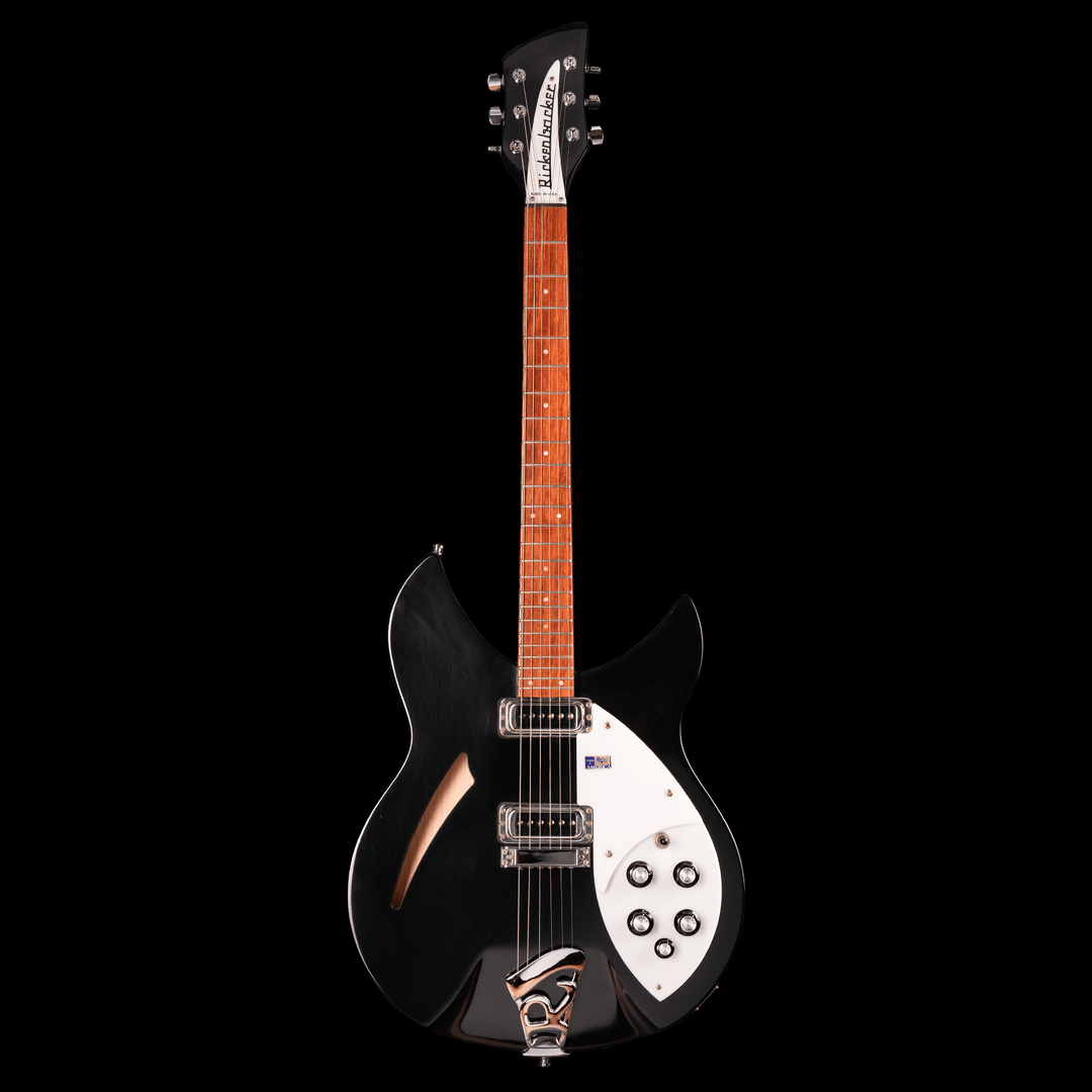 Rickenbacker 330 Jetglo 2006 - Guitarra Eléctrica | Careful acoustic research has resulted in the full, rich and warm sound of this popular model. Two single coil pickups on a full size body are accented by a traditionally shaped sound hole. The 24 fret R