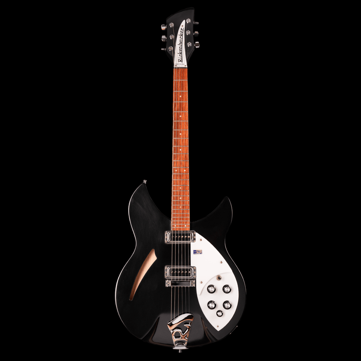Rickenbacker 330 Jetglo 2006 - Guitarra Eléctrica | Careful acoustic research has resulted in the full, rich and warm sound of this popular model. Two single coil pickups on a full size body are accented by a traditionally shaped sound hole. The 24 fret R
